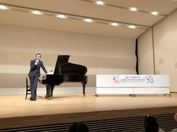 田口翔先生トークコンサート立つ.JPG
